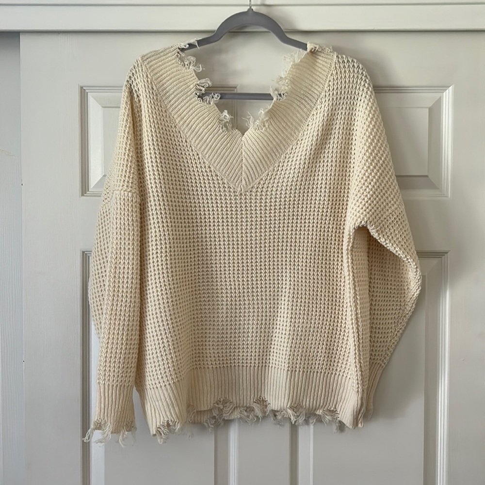 Frayed hem sweater
